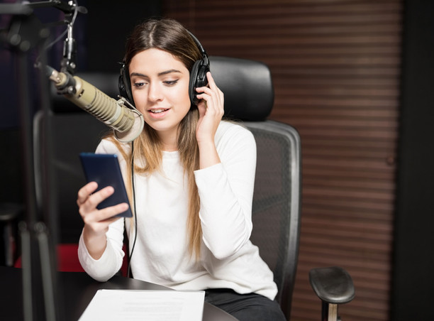 Content creator recording social media material